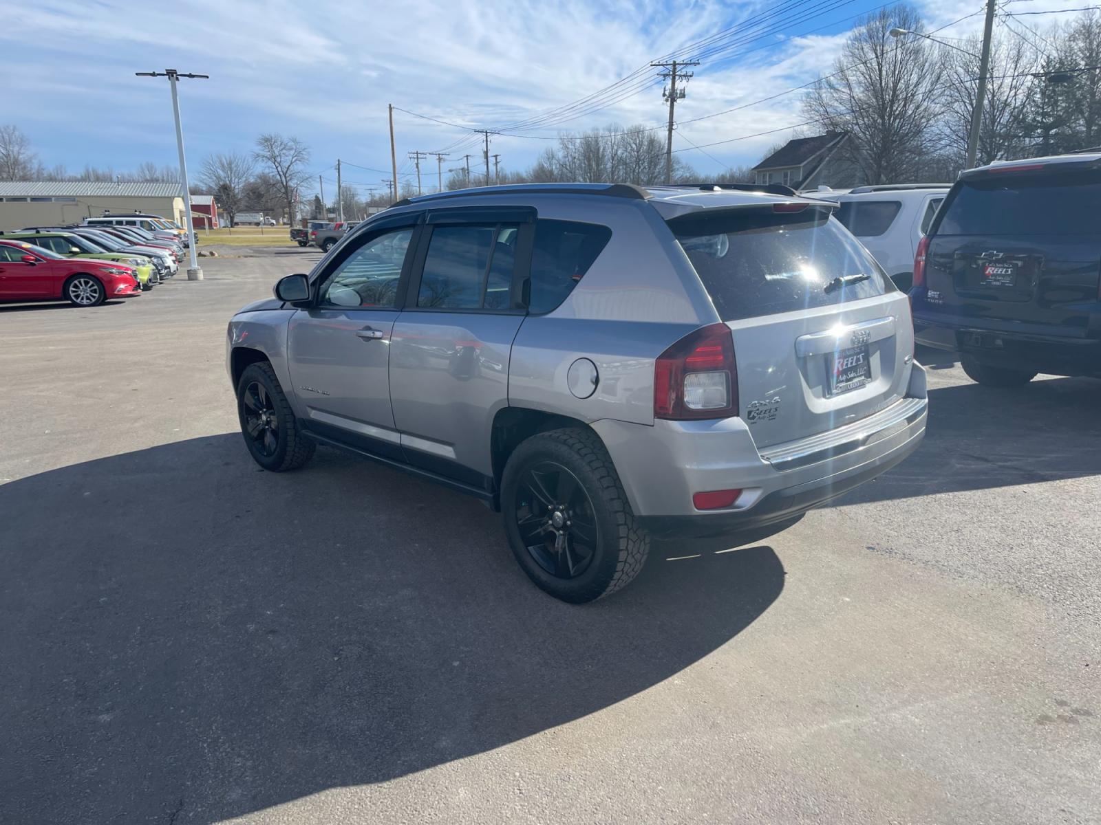 2015 Silver /Black Jeep Compass High Altitude 4WD (1C4NJDEB0FD) with an 2.4L I4 DOHC 16V engine, 6 Speed Automatic transmission, located at 547 E. Main St., Orwell, OH, 44076, (440) 437-5893, 41.535435, -80.847855 - This 2015 Jeep Compass High Altitude 4WD comes with several premium features designed for comfort, convenience, and performance. These include heated leather seats for comfort during colder days, a power sunroof that adds an airy, open feeling to the cabin, a power driver's seat to find the perfect - Photo #11